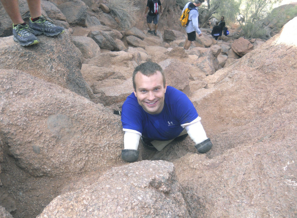 Kyle Maynard climbing a mountain